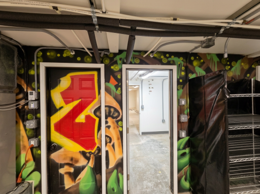 Quonset building-interior-main room- door to room 2 and open room 3-optimized.png