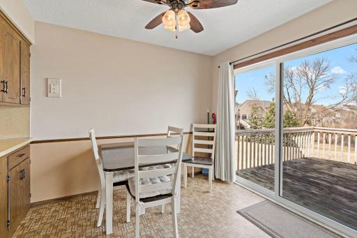Informal dining room with oversized patio door.