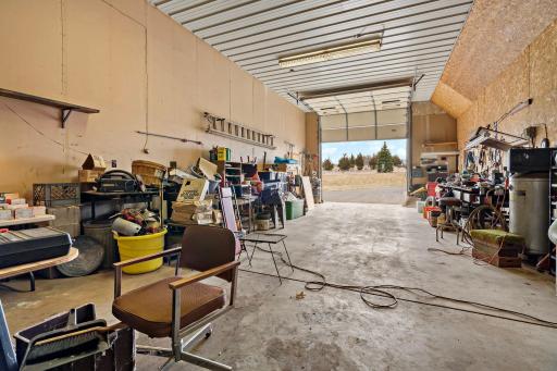 The outbuilding is equipped with two 12' overhead door.