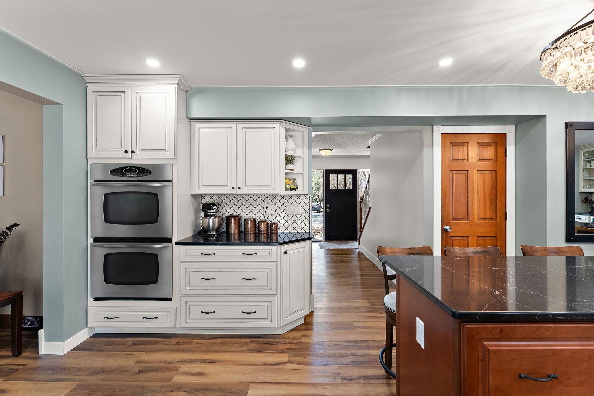 Baking corner with double ovens, counter space and all the cabinetry to keep your supplies organized.
