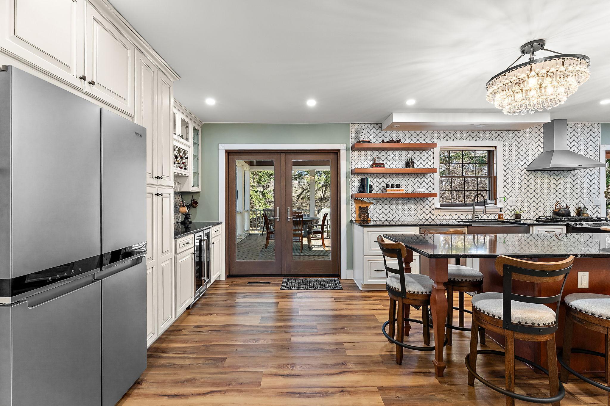 Easy indoor/outdoor living with a new sliding door to the screen porch