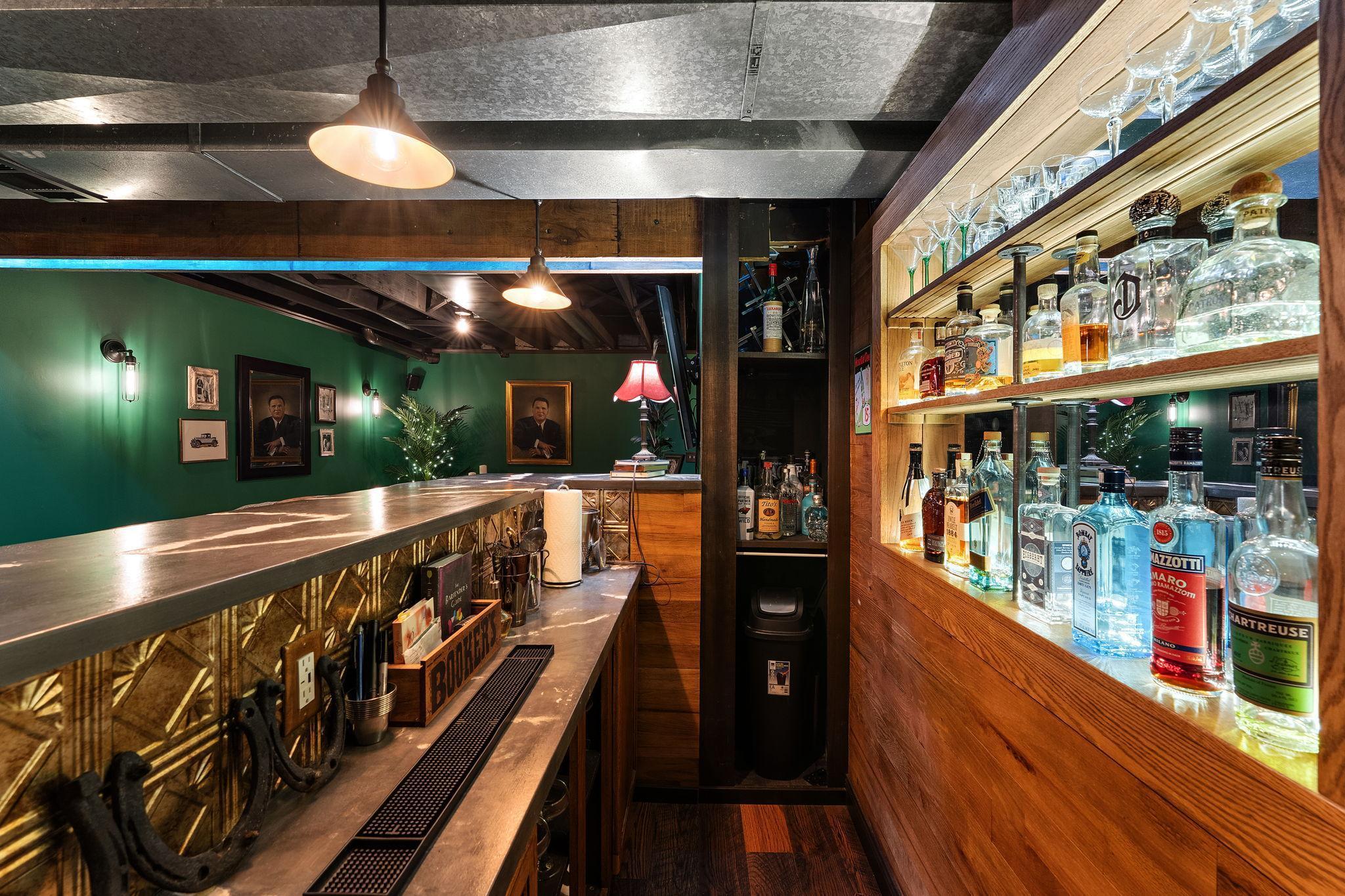 Custom designed bar, shelves and lighting