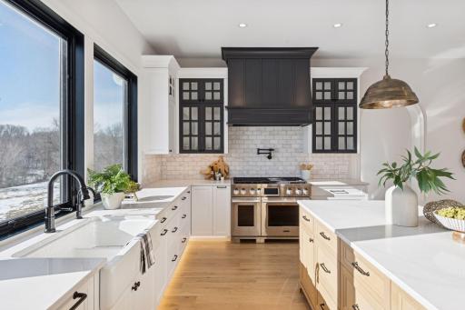 Spacious kitchen with an oversized center island, abundant prep space, and a layout designed for both everyday living and entertaining.