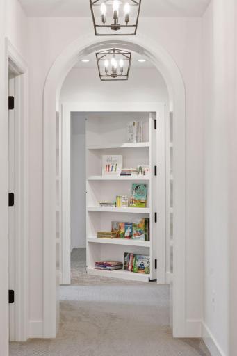 Discover a hidden door leading to a whimsical play space, perfect for kids, hobbies, or a creative retreat.