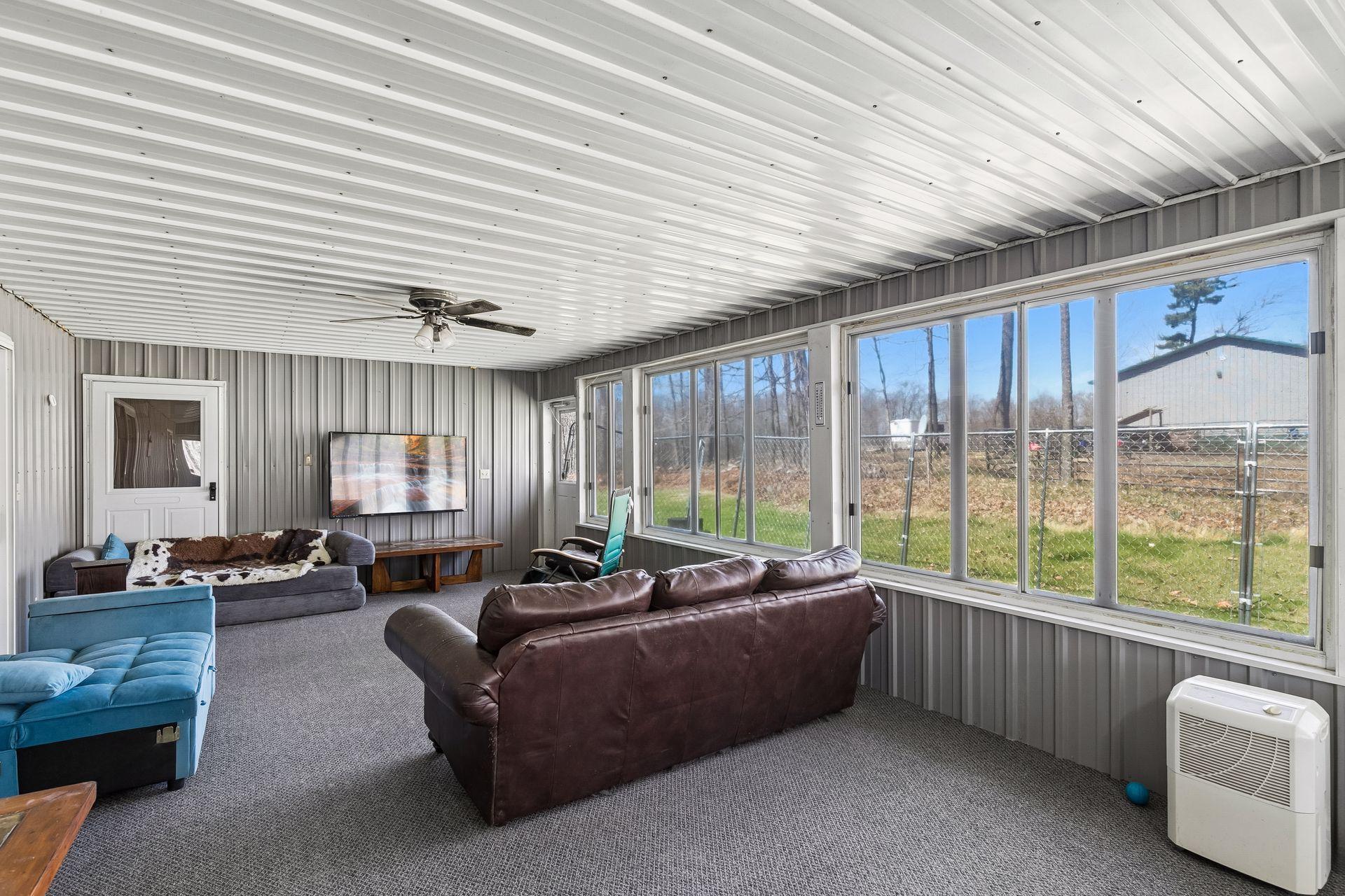Enclosed porch off kitchen/dining area