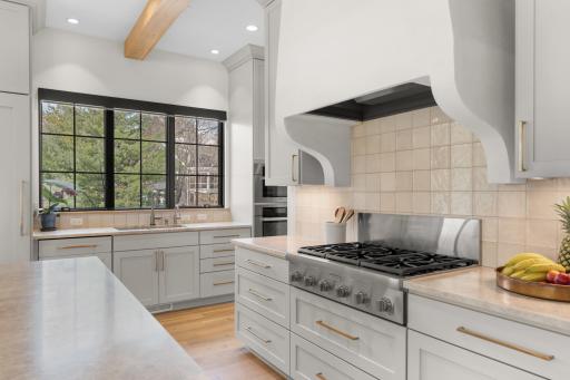 Premium appliance suite including steam oven, warming drawer, and dual-function microwave