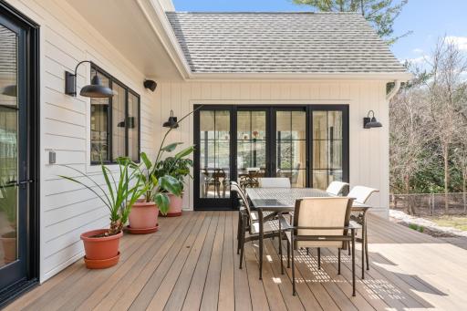 Sliding double patio doors lead to the deck