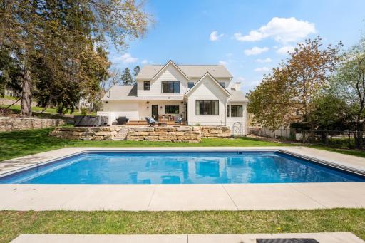 This custom Robert Gill Builder's home features 6 bedrooms, 5 bathrooms and over 6,800 sq ft.
