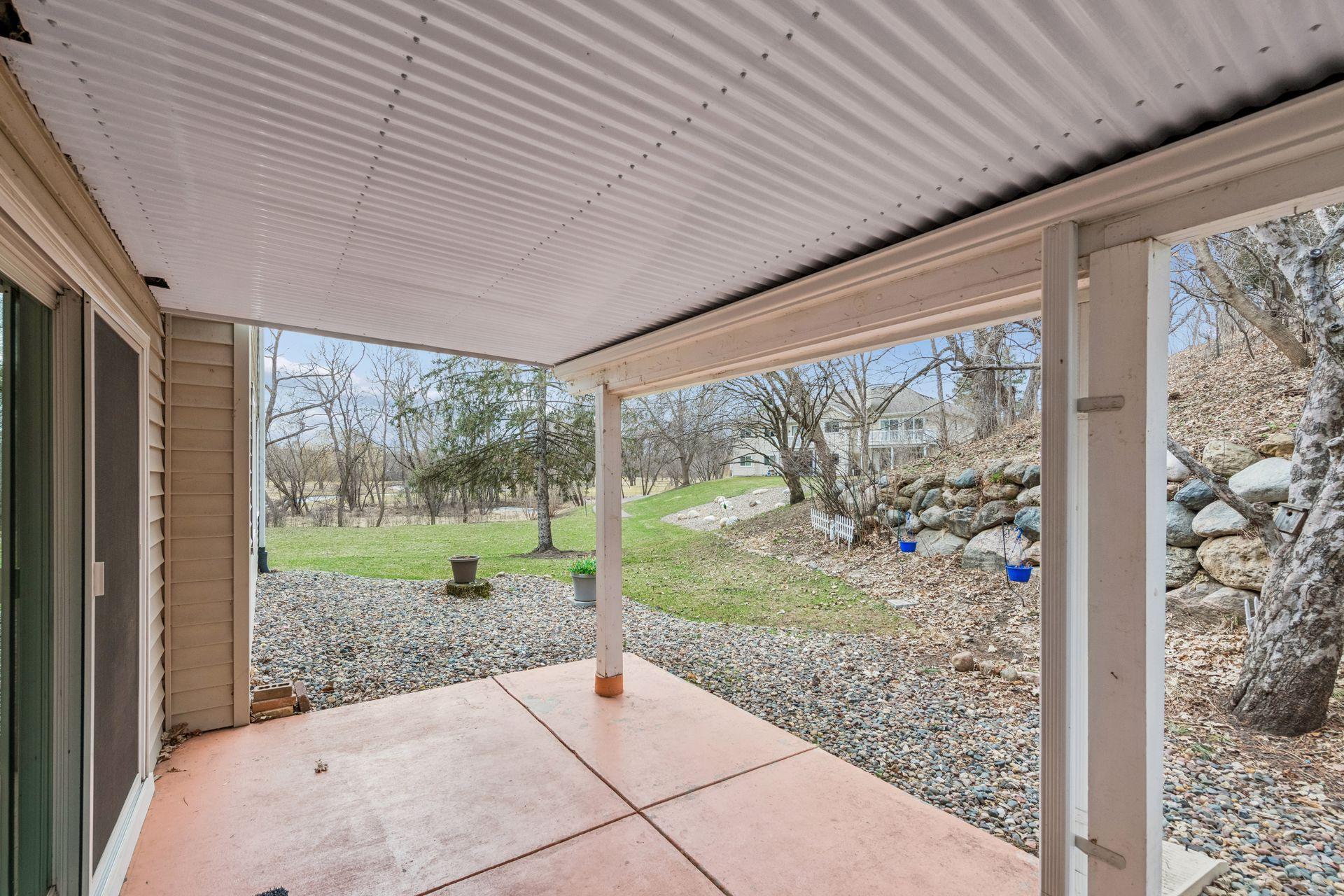 Patio view to walking path and golf course