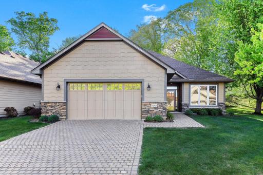 Luxury Detached Villa with designated boat slip on Upper Prior Lake. This custom built home offers every luxury detail you would desire!