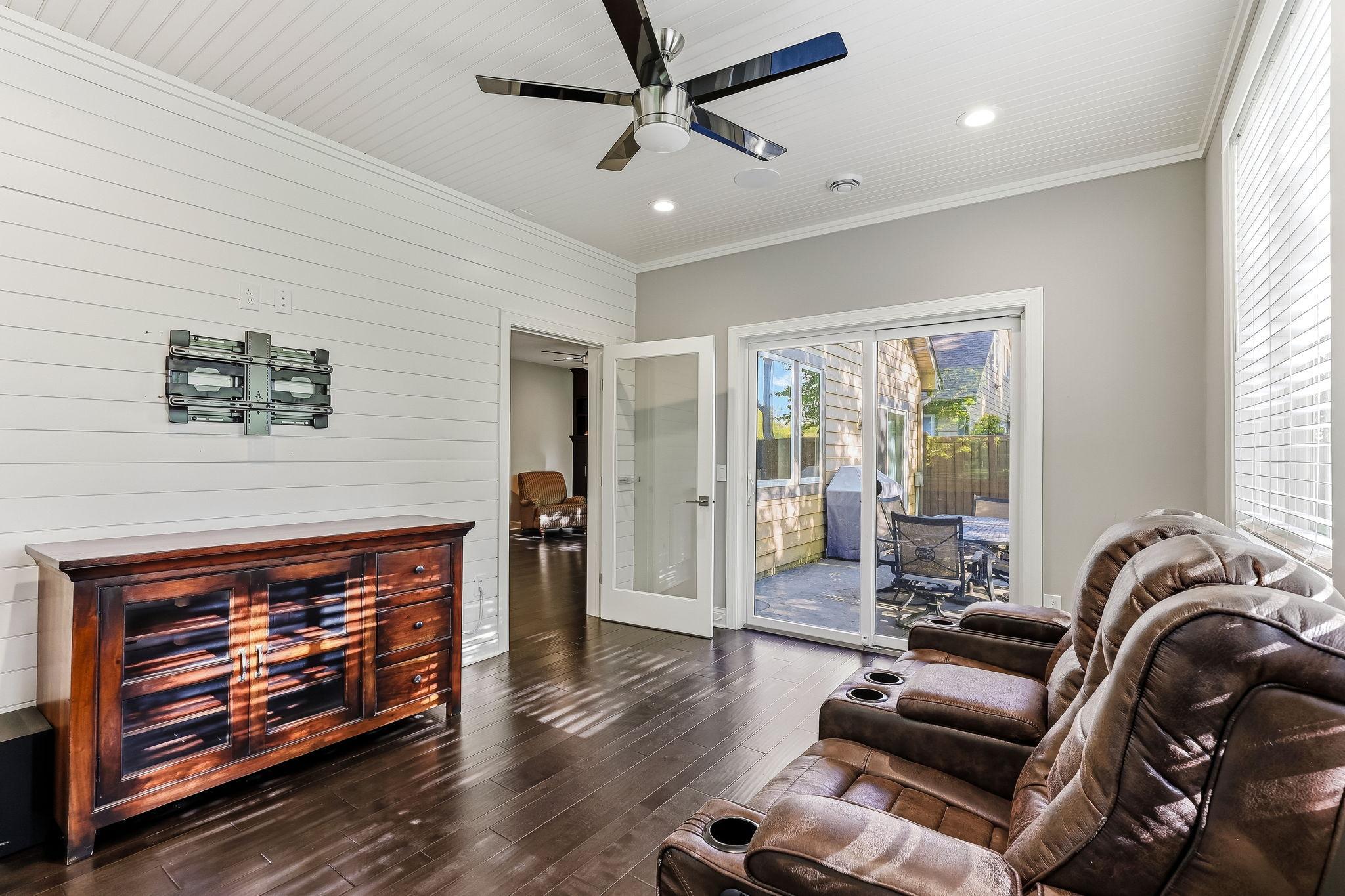 The 4 Season Porch features sliding glass door with access to the patio