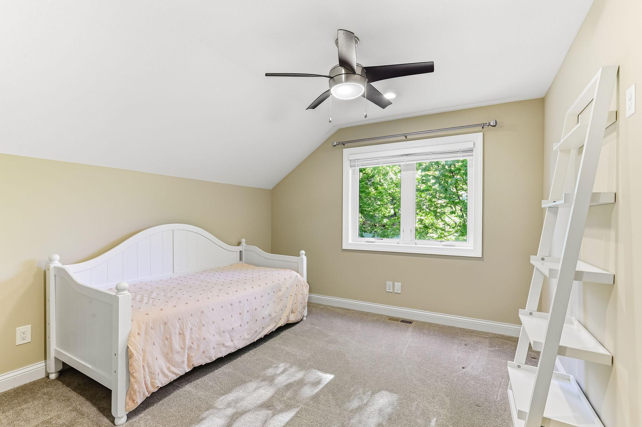 Bedroom 2 features ceiling fan