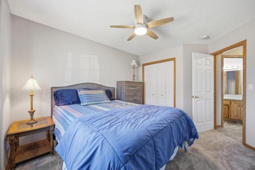 Upstairs Bedroom # 2 with new ceiling fan and carpet
