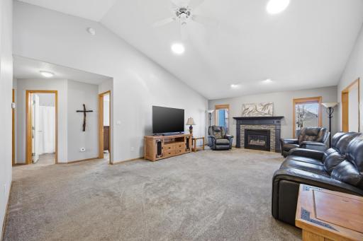 Living Room Featuring Gas Fireplace and 2 Tubular Skylights