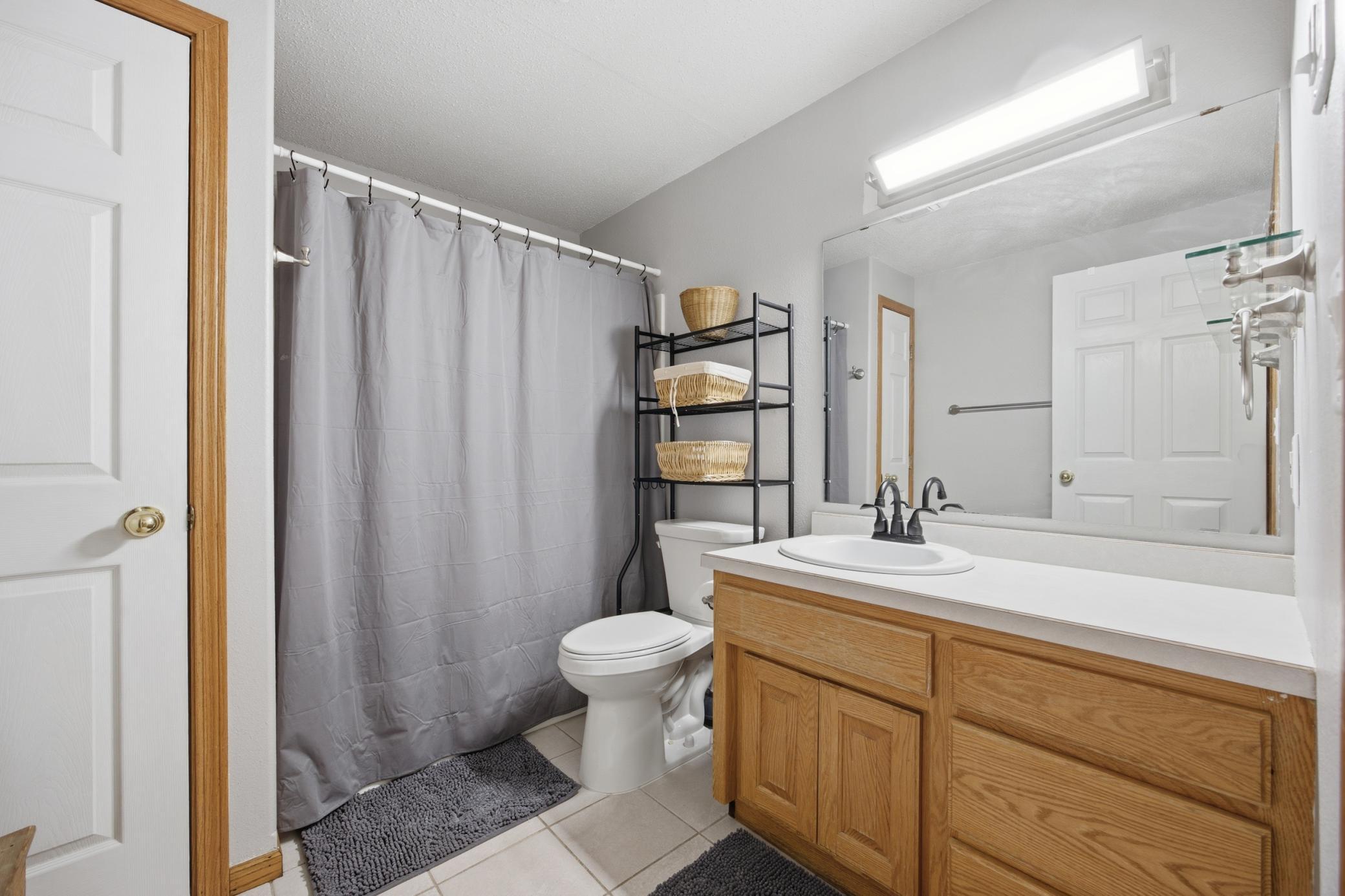 Basement Full Bath with Heated Floors and Linen Closet