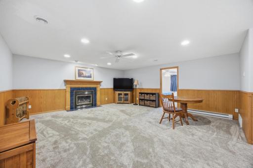 Family Room with New Carpet and Gas Fireplace