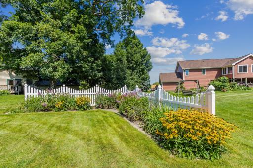 Well-Well-Maintained Exterior with Sprinkler System Supporting Lush Landscaping.exterior with sprinkler system supporting lush landscaping.