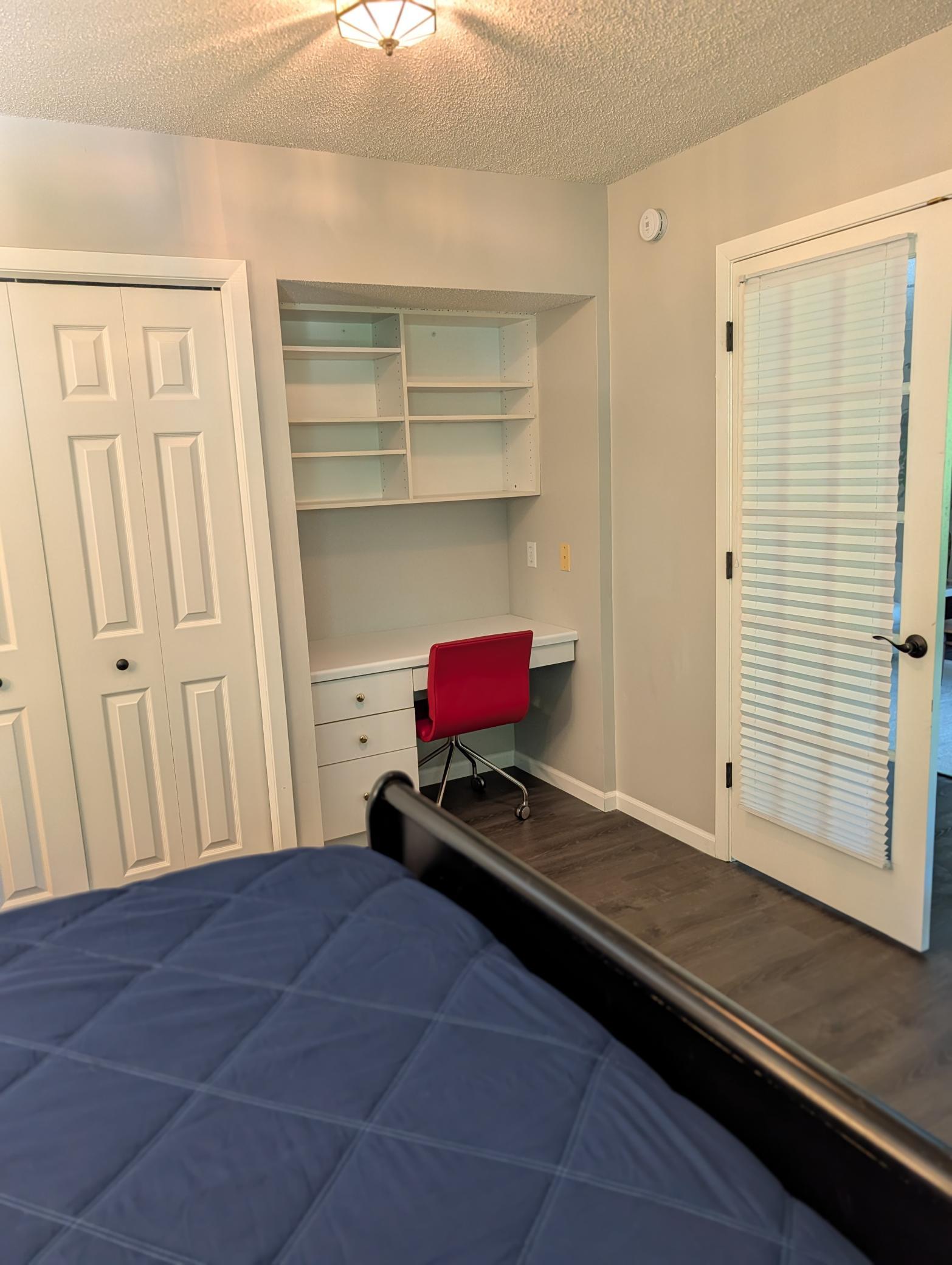 2nd bedroom built in desk and shelving