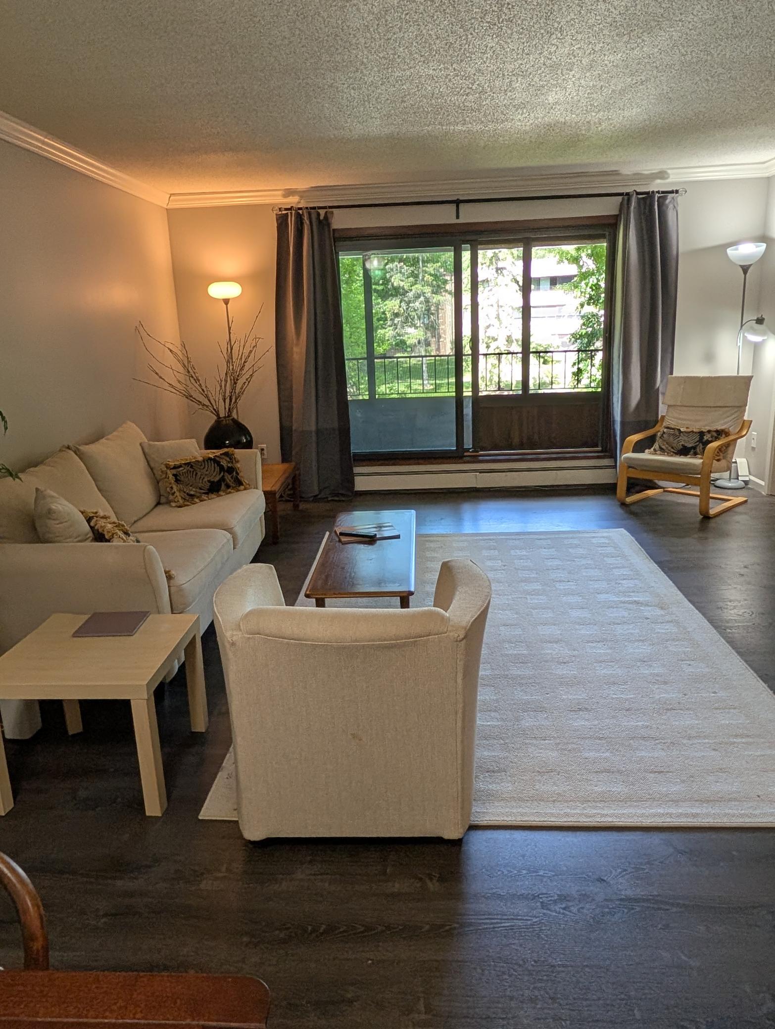 Great room/living room out to screened in porch