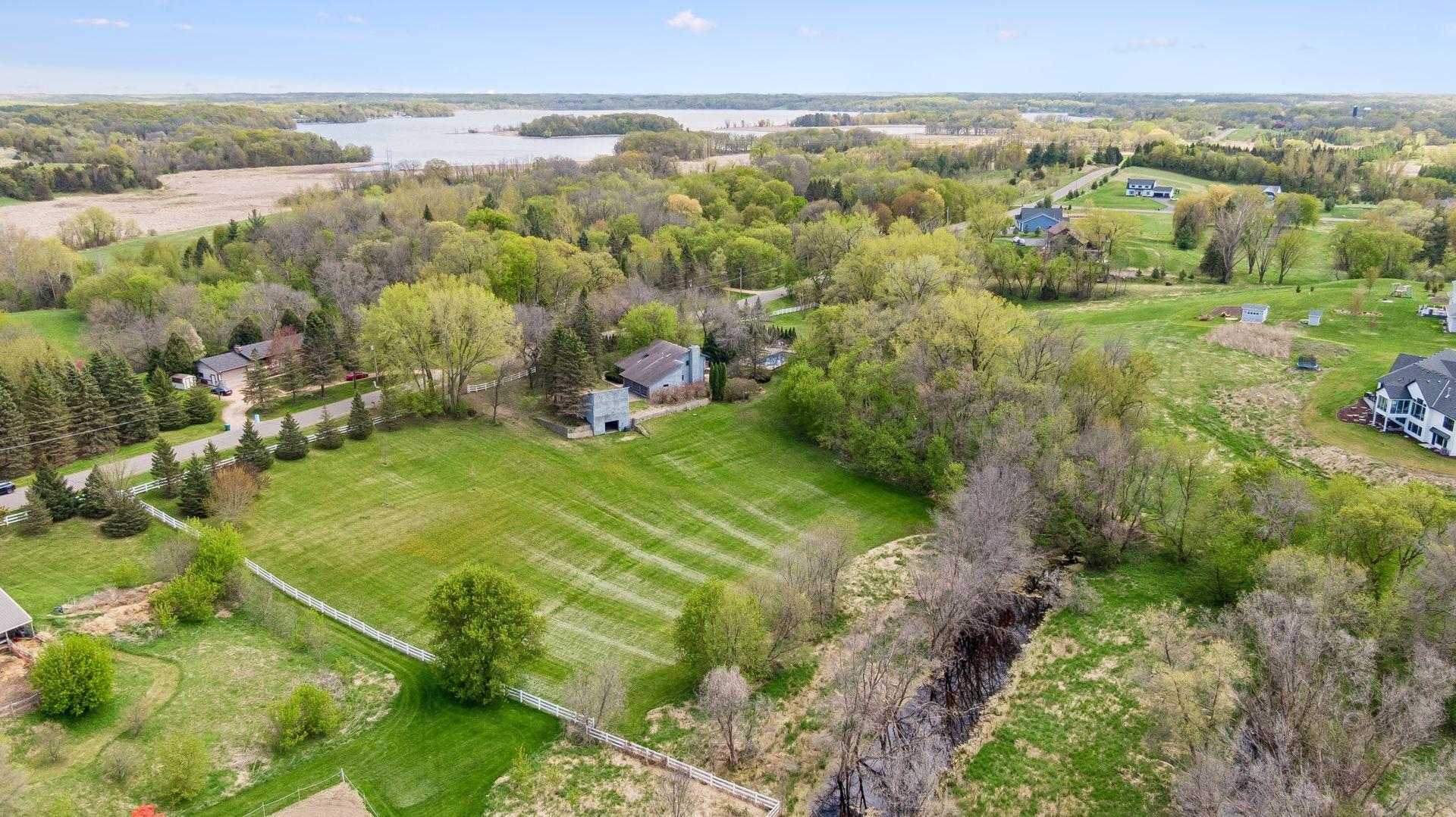 Nestled on five private acres near Lake Independence.