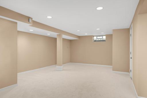 Extraordinary lower level Family room with good ceiling height and recessed lighting