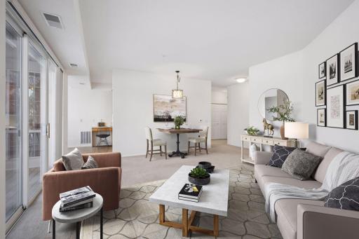 This Living room/ dining room has been virtually staged!