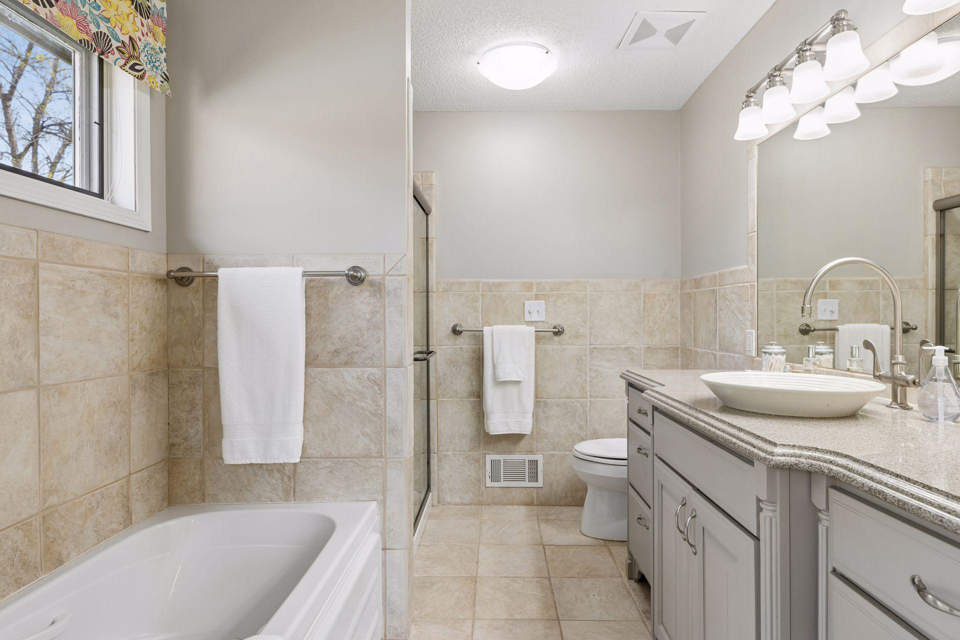 5718 Auto Club Circle Owners Private Full Bath.jpg