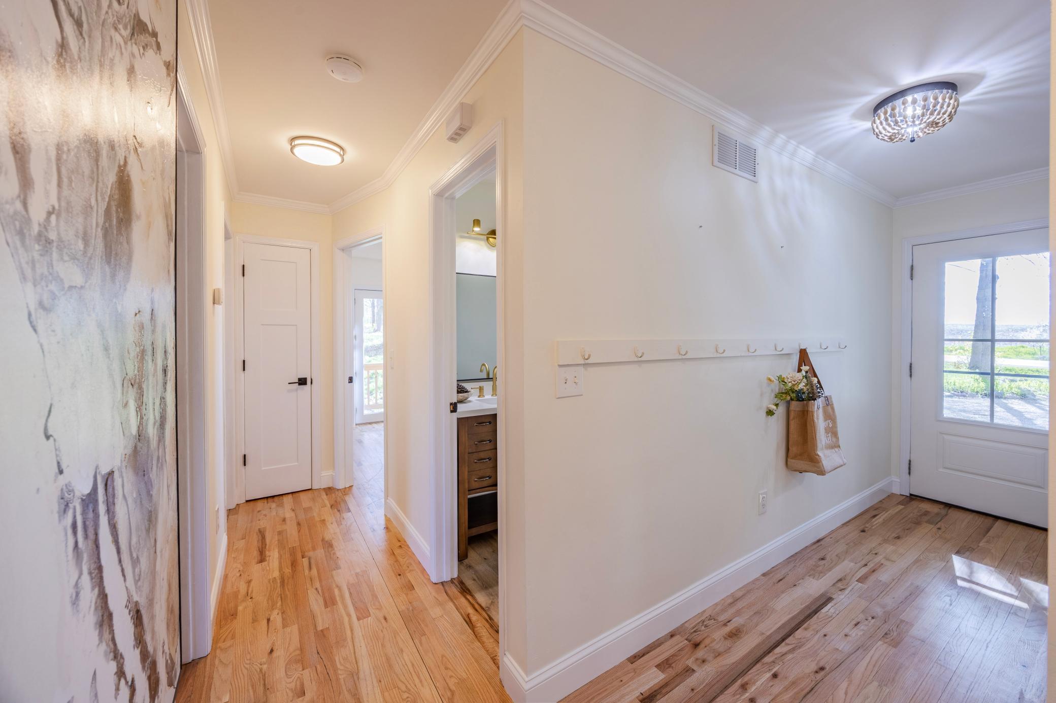 Entry way and hallway to bedrooms