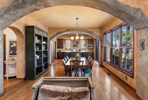 Living room flows perfectly into the dining and kitchen spaces