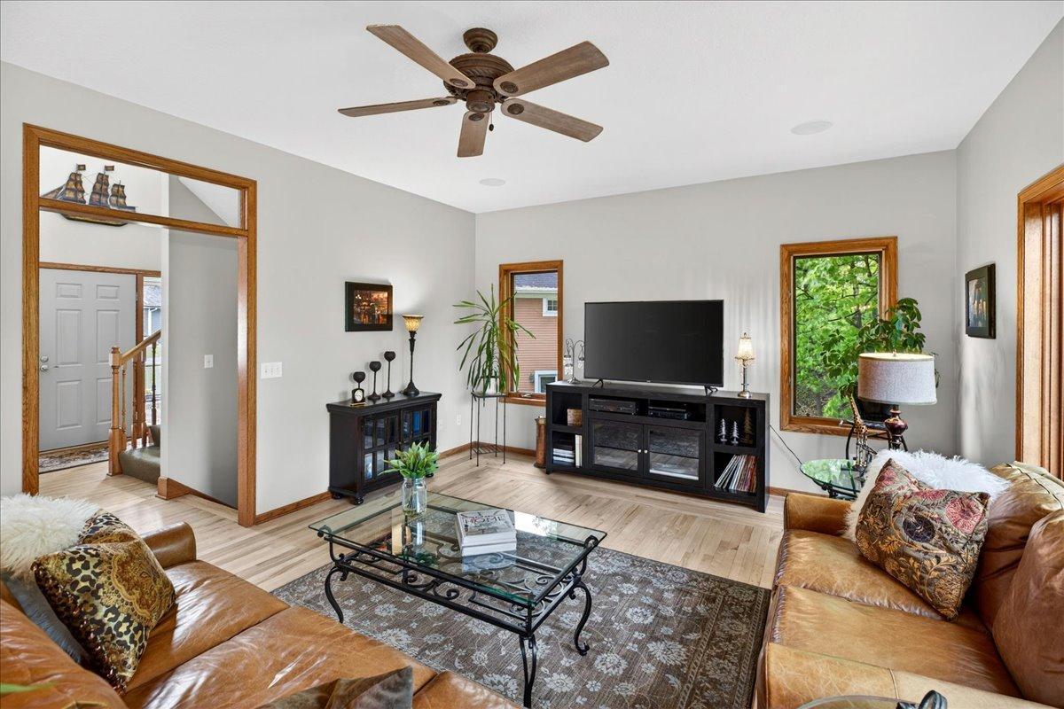 Great Room is convenient to front entry. There is a ceiling fan.