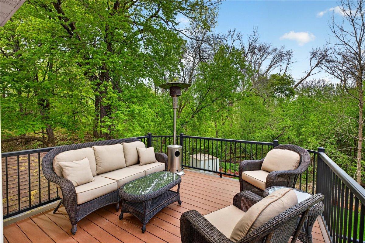 There is a fabulous updated maintenance-free deck, railing and stairs with a locking gate. It is accessed directly off kitchen and has an additional area for grill.
