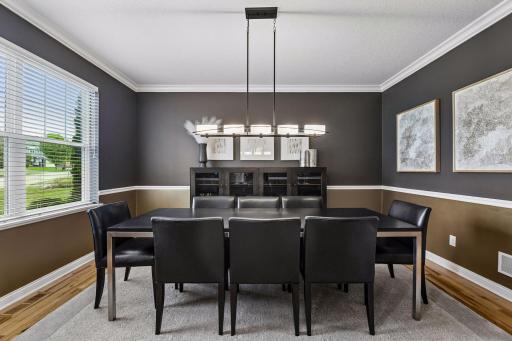 Formal dining room as you enter the home to the left