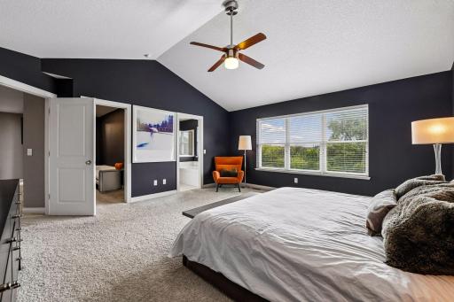 Owners suite opens to custom closet and owners bath