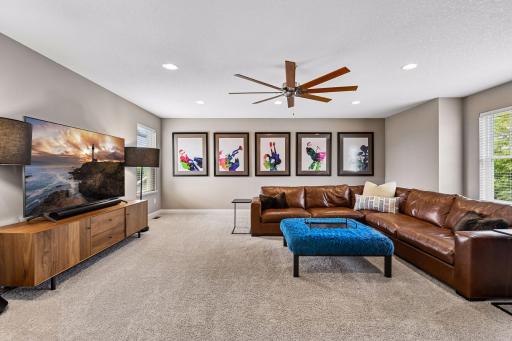 Upper level bonus room with large custom ceiling fan