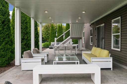 Lower level stamped concrete patio with ample seating
