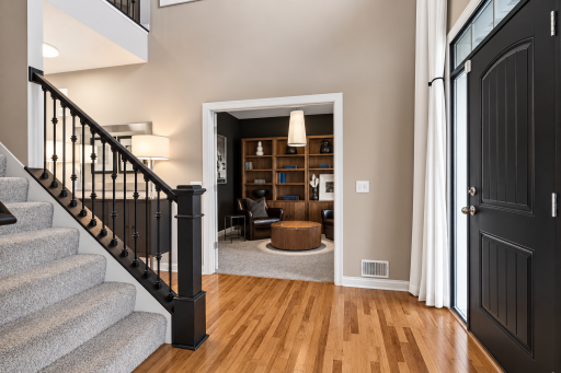 As you enter the home you're greeted by a two story foyer.