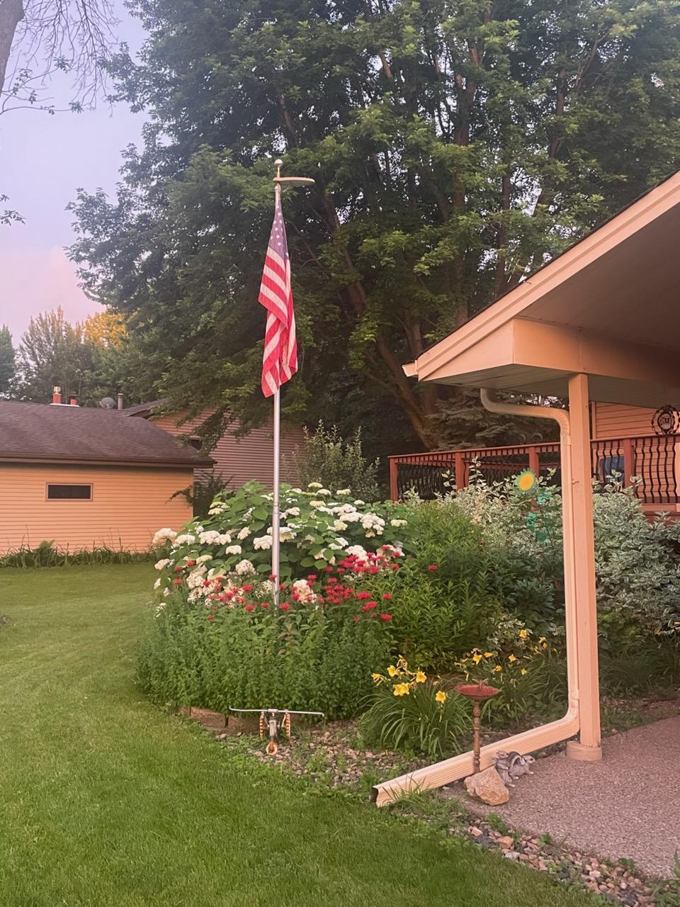Beautiful and full front garden-pic from homeowner