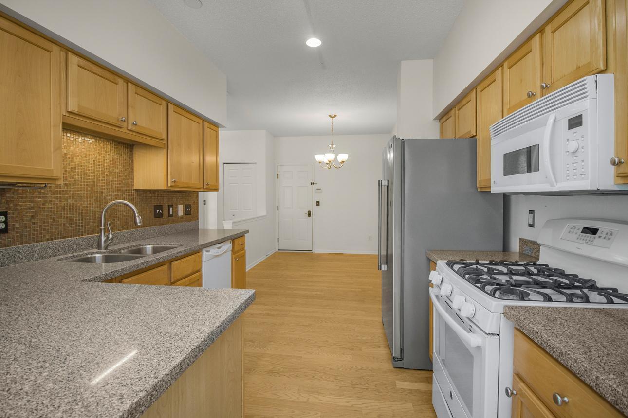 Kitchen and Informal Dining with Hardwood Floors.jpg