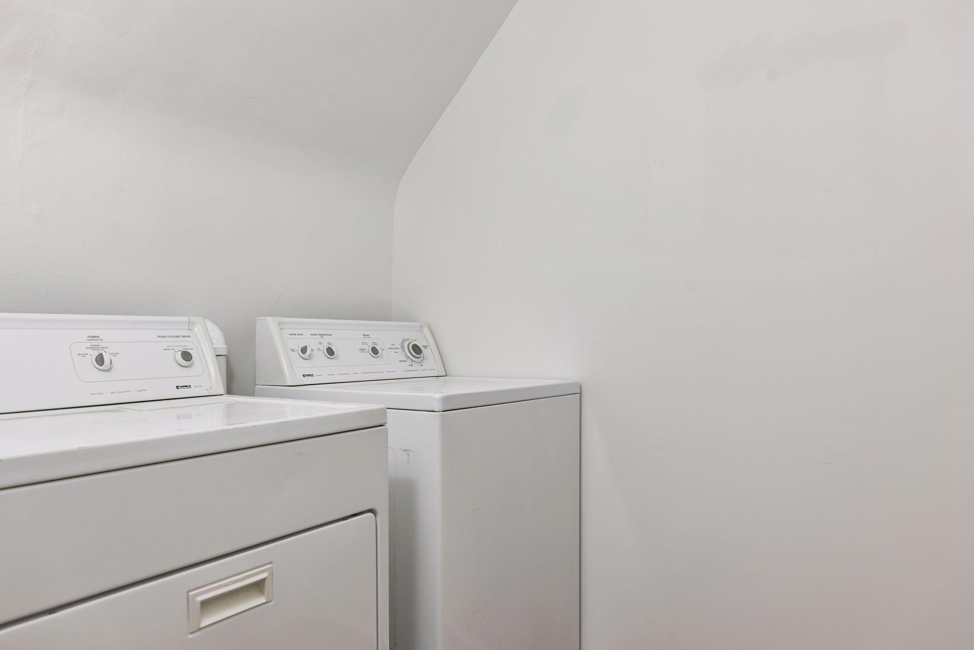 Multiple laundry options with setups on the third floor and lower level, plus space to add an additional washer and dryer on the second floor.