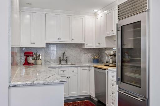 Butlerâs pantry and secondary prep area connect effortlessly to the main kitchen, offering added storage, workspace, and flexibility.