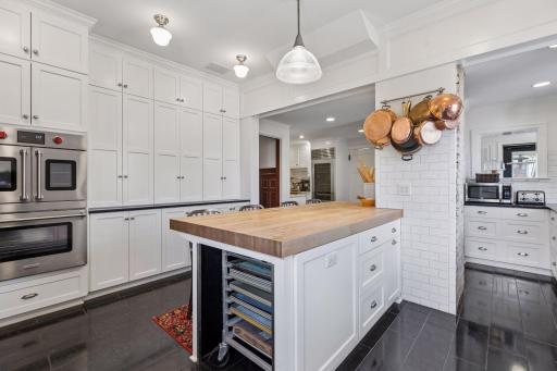 A stunningly updated, 2-part chef's kitchen with adjacent butlerâs pantry give this home elegance and function in equal measure.