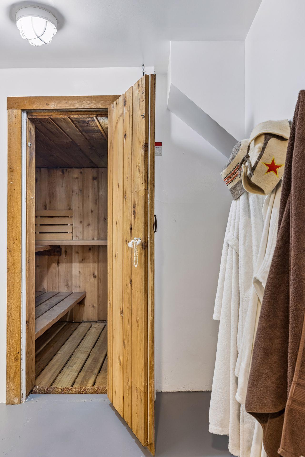 Cedar sauna creating a warm, spa-like retreat for relaxation and wellness.