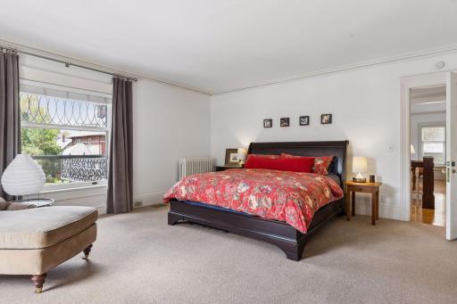 The primary suite includes a full bathroom and a great-sized closet with the opportunity to expand into a more elevated and functional retreat over time.