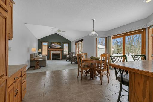 Flowing Floorplan - Large Windows and Patio Door Brings in Natural Light, Making this Space the Hub of the Home