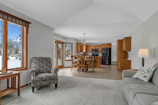 View from Family Room - Patio Door off Dining Area Leads to a Spacious Back Yard