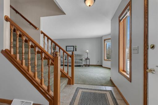 Welcoming Foyer Entry - Warm Tones Throughout