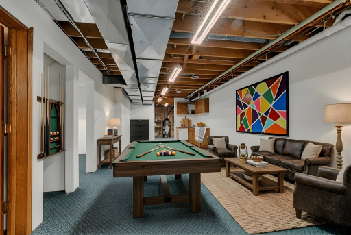 33 x 12.5 Open Area in Basement - Complete the Ceiling to Add an Additional 400+ Finished Sq Ft - Virtually Staged as Game Room