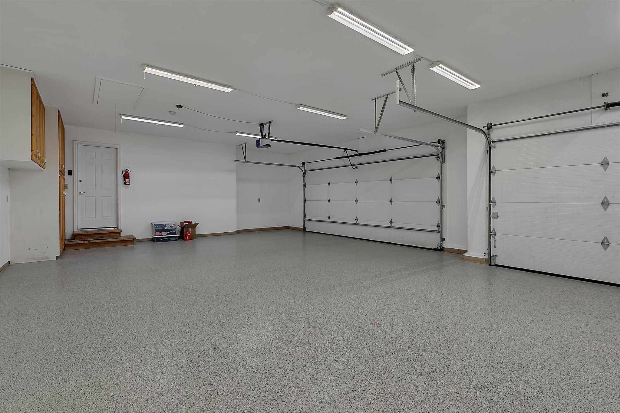 Newer High End Epoxy Flooring - Heated - Insulated - Extra Bright Lighting - Makes for a Perfect Working Garage
