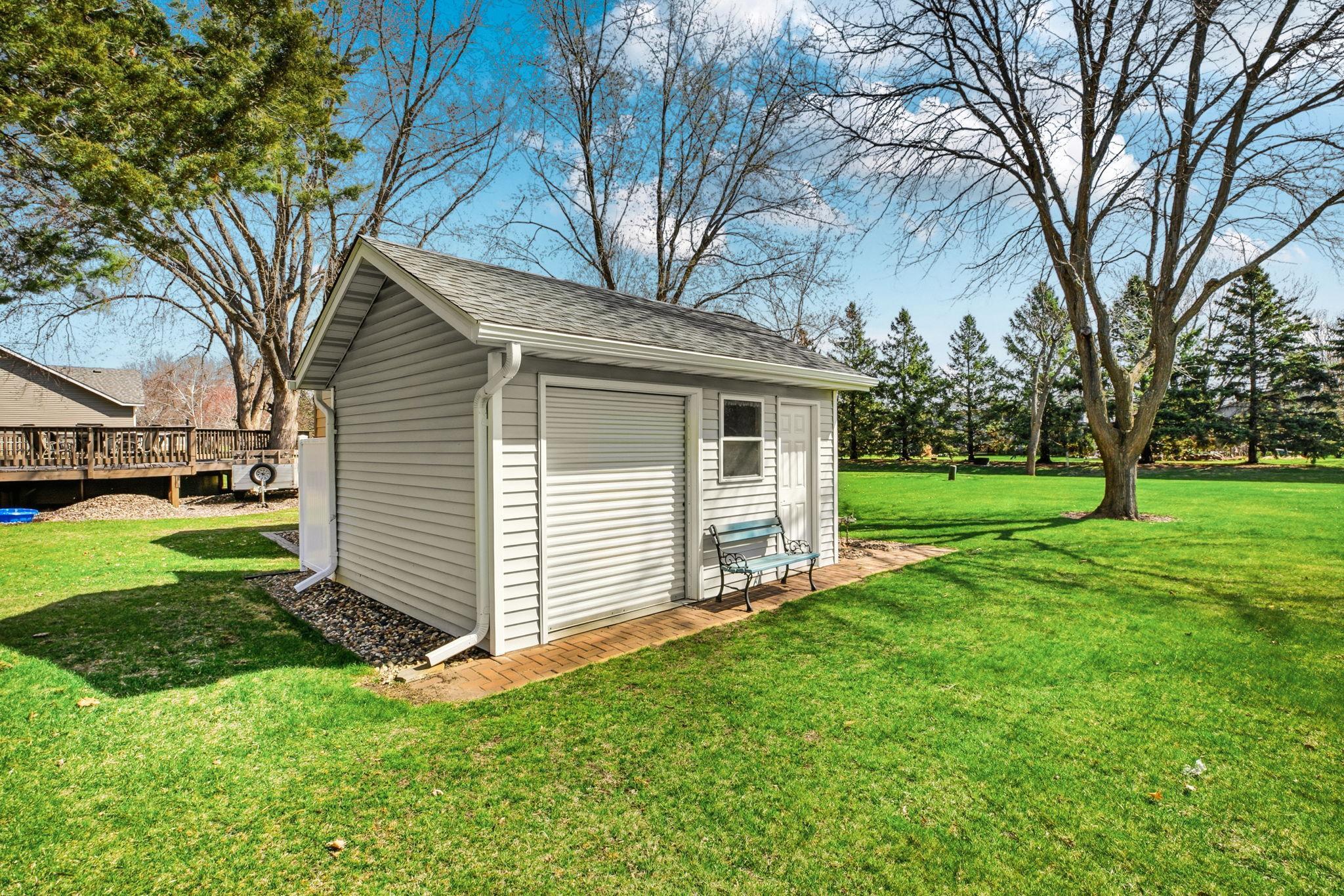 Over Head Garage Door - Perfect for Your Riding Mower and Seasonal Storage