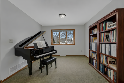 Foster Your Musical Talents by Using this Space as a Music Room and Library - Virtually Staged
